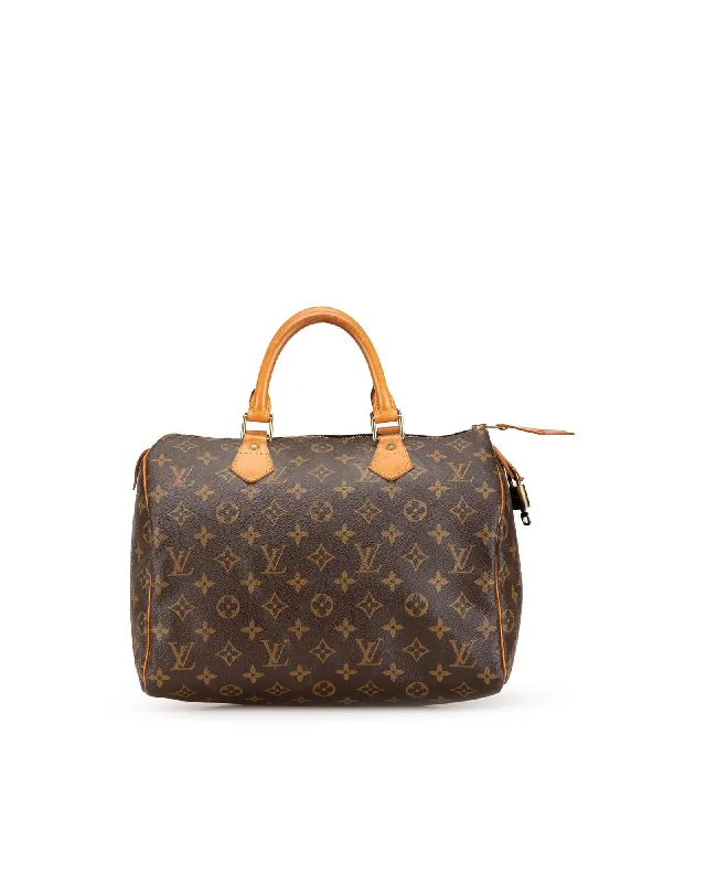 Monogram Canvas Speedy Bag with Vachetta Leather Handles and Top Zip Closure