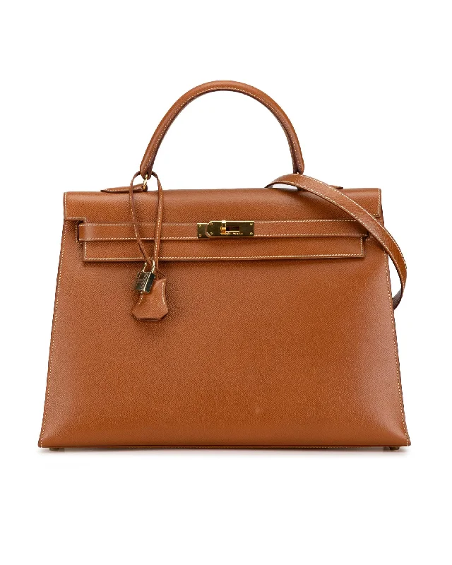 Vintage satchels for women with distressed leather for a retro-inspired fashion statement -Kelly Retourne 35 Courchevel Leather Bag with Detachable Strap and Interior Pockets