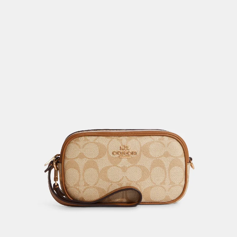 Handle bags with bold logos for branding -Coach Outlet Jamie Wristlet In Signature Canvas