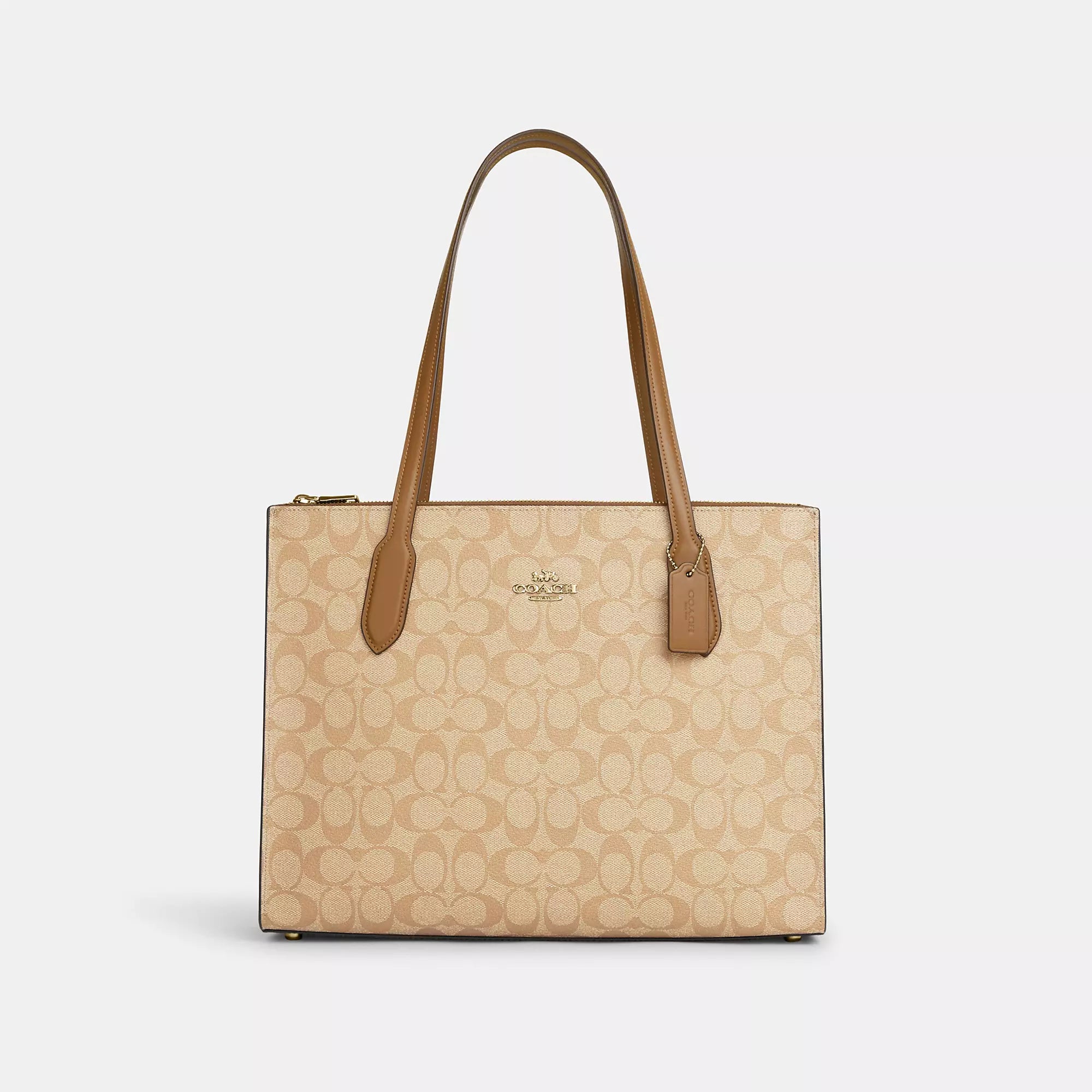 Handle bags with monogram designs for personalization -Coach Outlet Nina Carryall In Signature Canvas