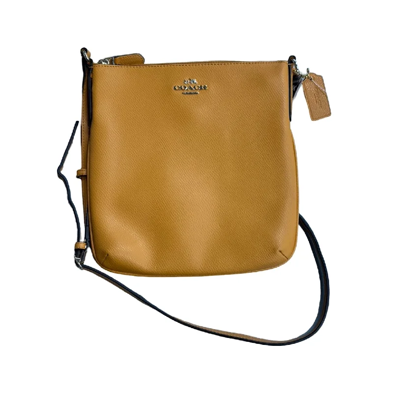 Handle bags with pastel colors for softness -Crossbody Designer By Coach in Yellow, Size: Small