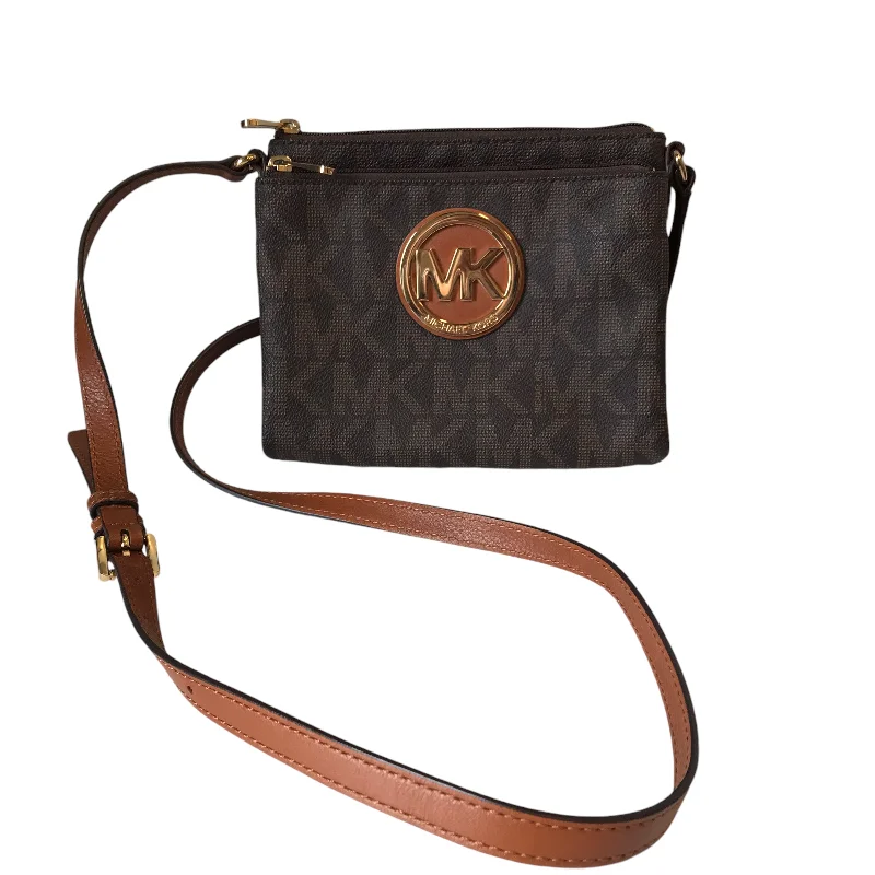 Handle bags with modern cutouts for style -Crossbody Designer By Michael Kors In Brown, Size:Medium