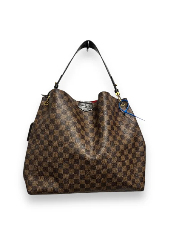 Handle bags with lightweight nylon for ease -Handbag Luxury Designer By Louis Vuitton, Size: Large