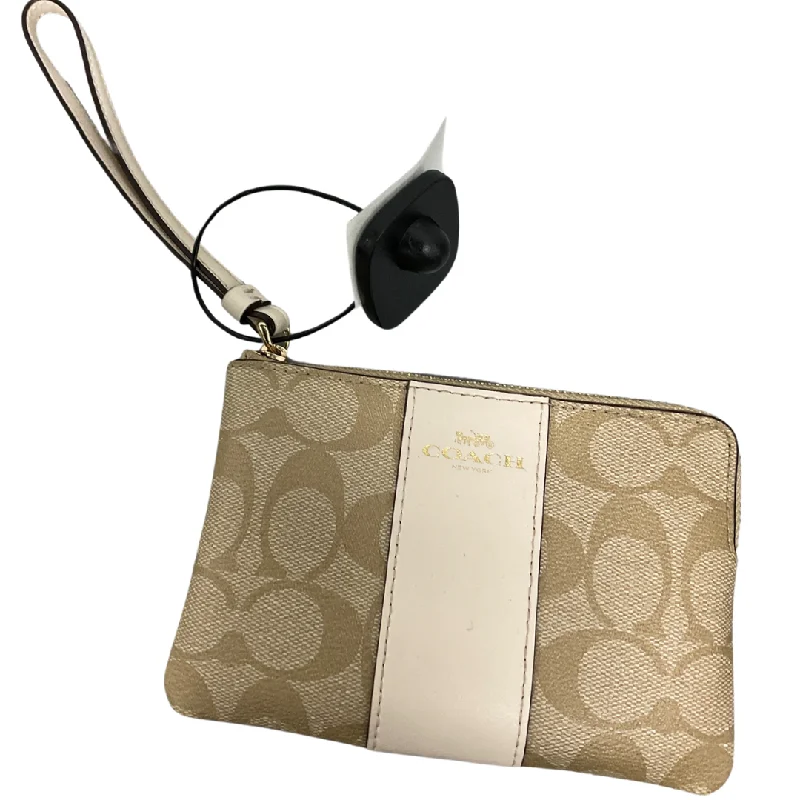 Handle bags with hidden pockets for security -Wristlet Designer By Coach, Size: Medium